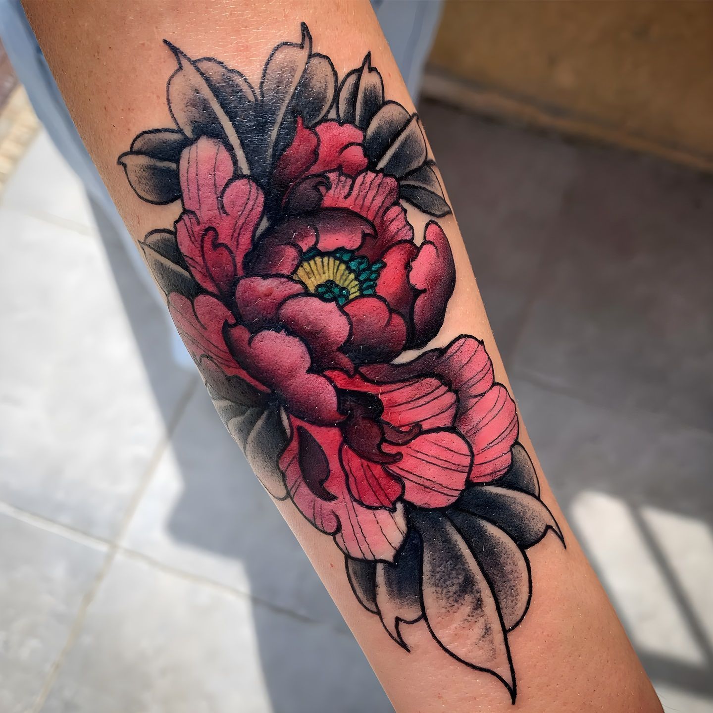 Tatuaje ren color de flores realizado por Aitor Murga en Ink for All Tattoo