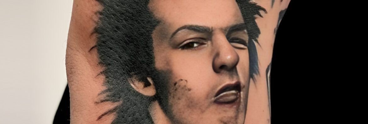 Tattoo realista de Sid Vicius, Sex Pistols realizado por Aitor Murga en Ink for All
